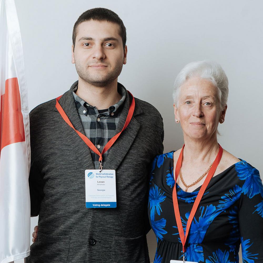 A man and a woman stand next to each other