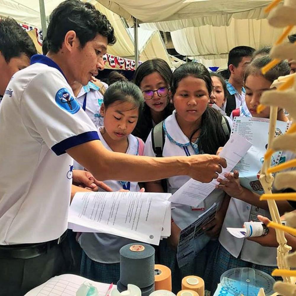 Photograph showing a celebration held in Cambodia to mark World PT Day 2018
