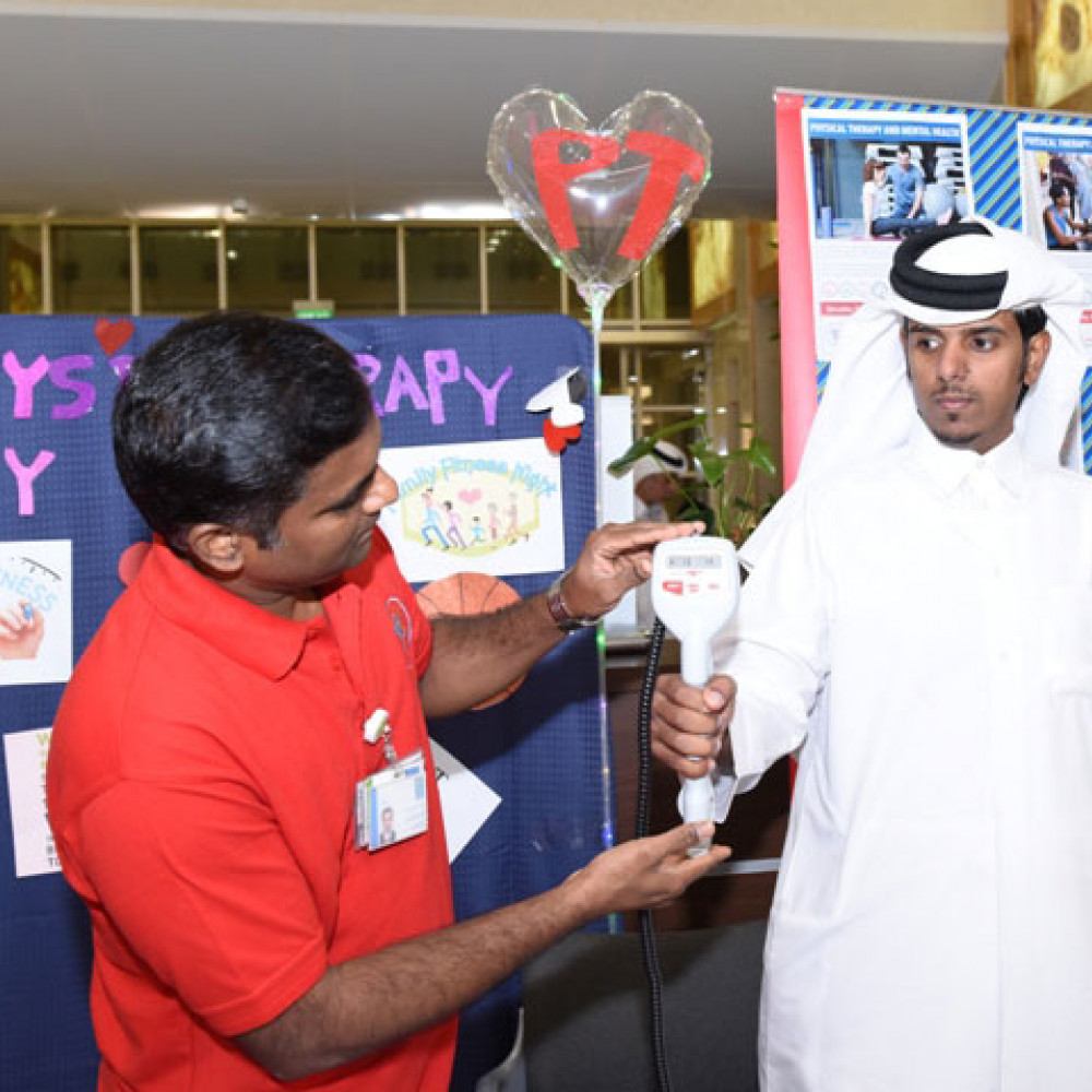 Photograph showing a celebration held in Qatar to mark World PT Day 2018