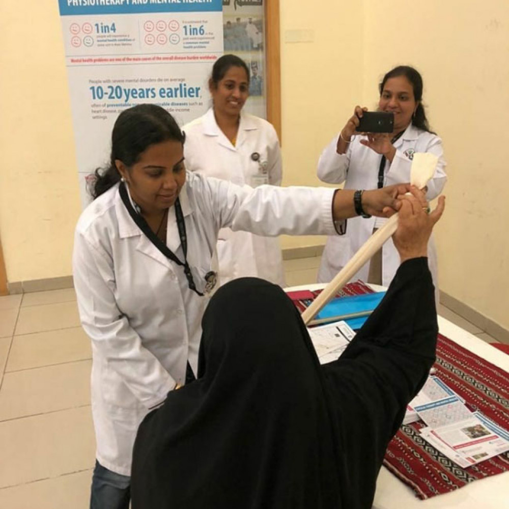 Photograph showing a celebration held in the United Arab Emirates to mark World PT Day 2018