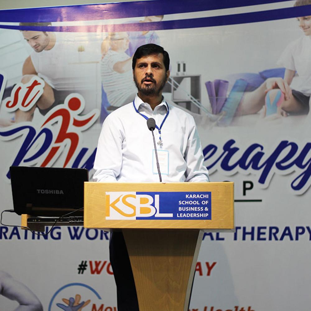 Photograph showing a celebration held in Pakistan to mark World PT Day 2019