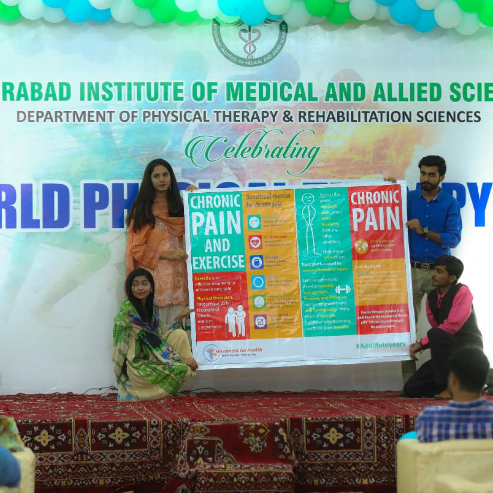 Photograph showing a celebration held in Pakistan to mark World PT Day 2019