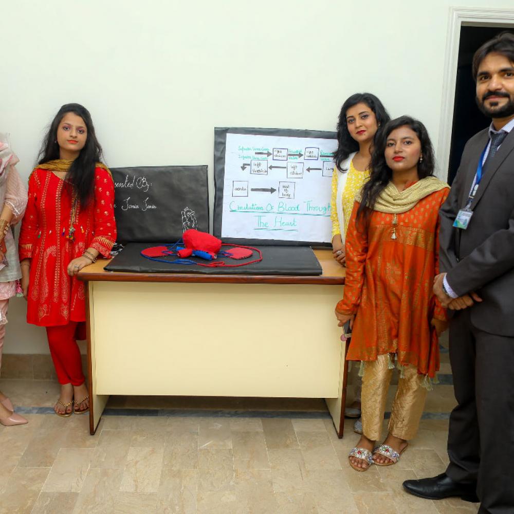 Photograph showing a celebration held in Pakistan to mark World PT Day 2019