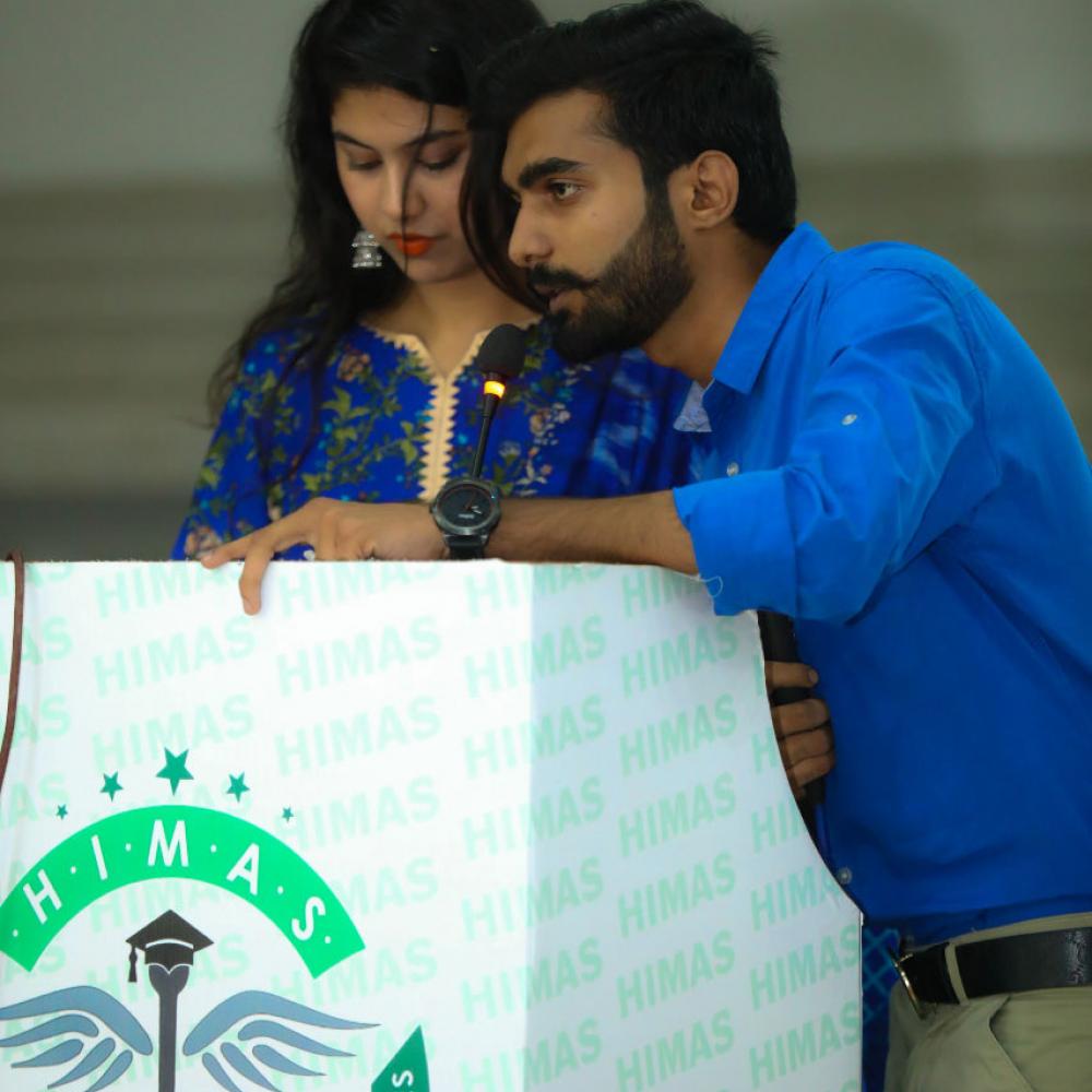 Photograph showing a celebration held in Pakistan to mark World PT Day 2019