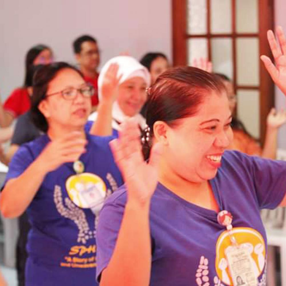 Photograph showing a celebration held in Philippines to mark World PT Day 2019