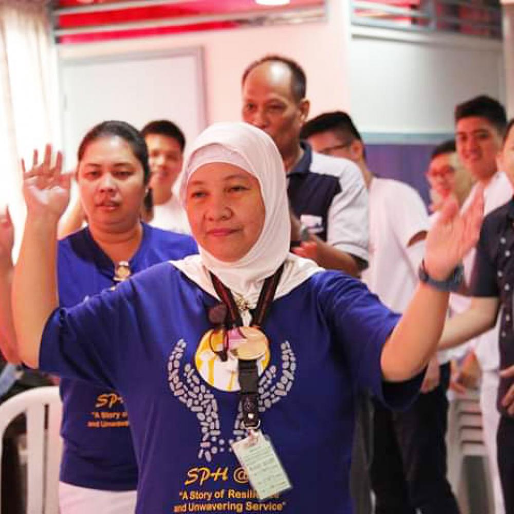 Photograph showing a celebration held in Philippines to mark World PT Day 2019