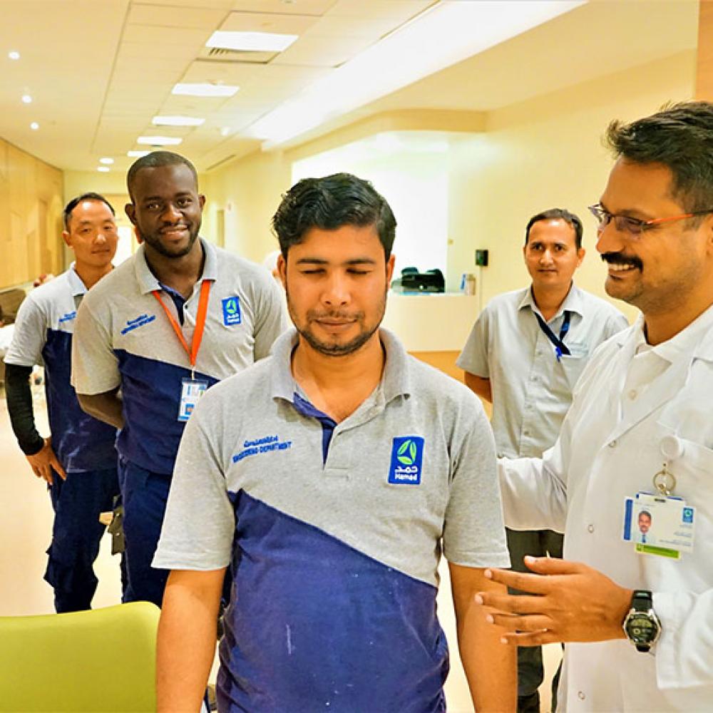 Photograph showing a celebration held in Qatar to mark World PT Day 2019