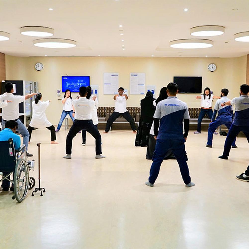Photograph showing a celebration held in Qatar to mark World PT Day 2019