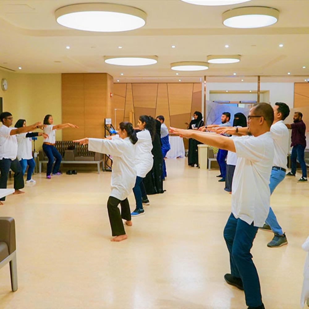 Photograph showing a celebration held in Qatar to mark World PT Day 2019