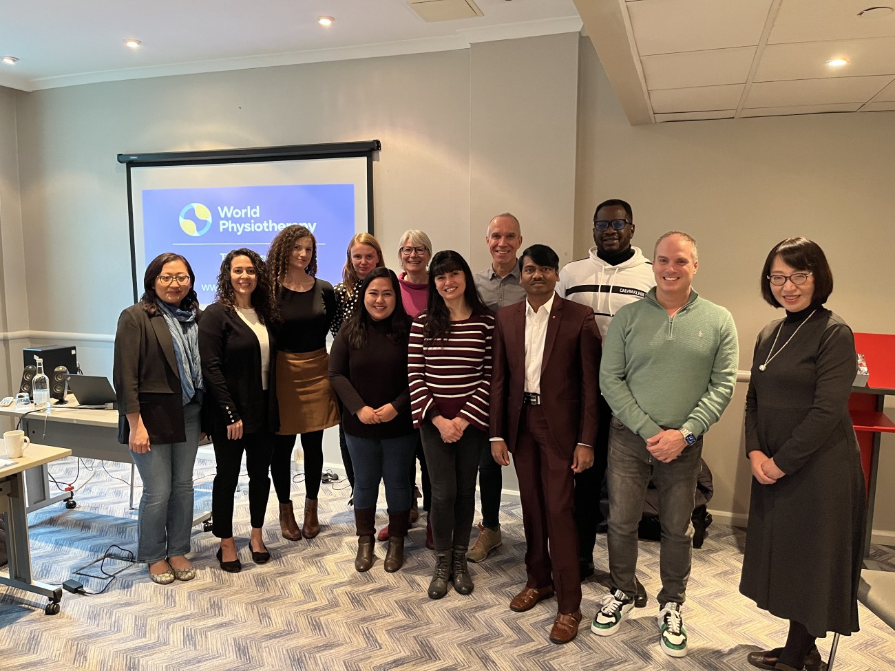 Members of the CPC with World Physiotherapy staff Lucy Ridley and Birgit Mueller-Winkler
