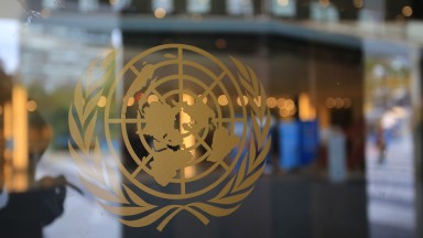 Photo of united nations sign on door